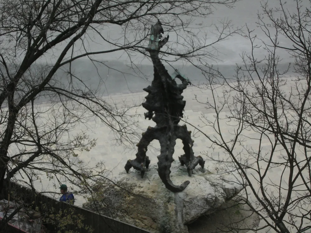 The Wawel Dragon statue beside the Vistula river in Krakow