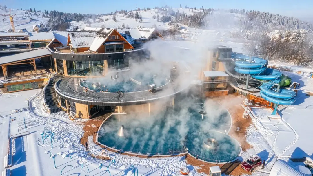 Steaming outdoor thermal pools in the snow near Zakopane